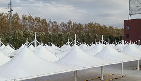 沈阳钢膜结构定制厂家提供停车棚，为你带来钢膜结构停车棚、遮阳棚设计！